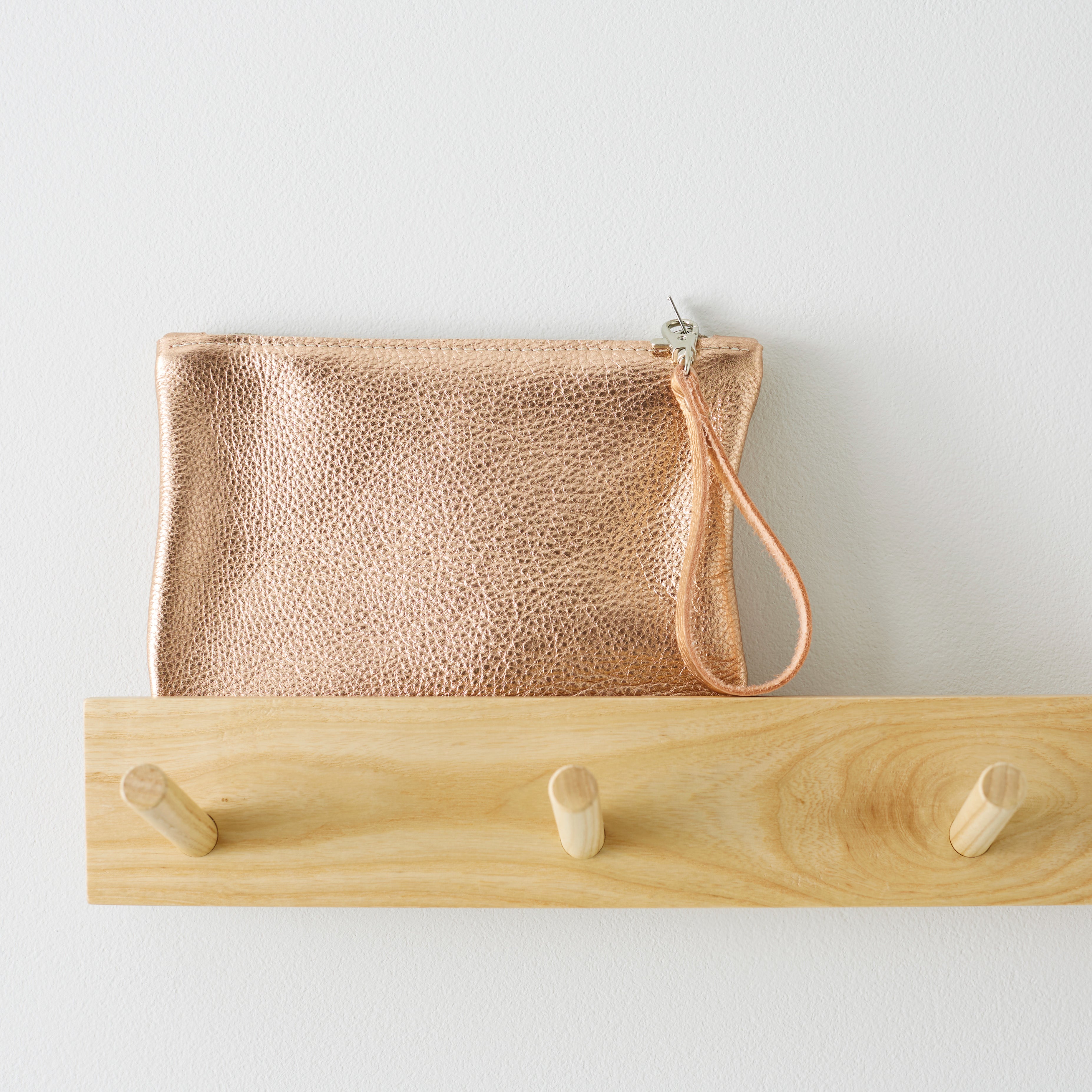 Rose gold wristlet bag online